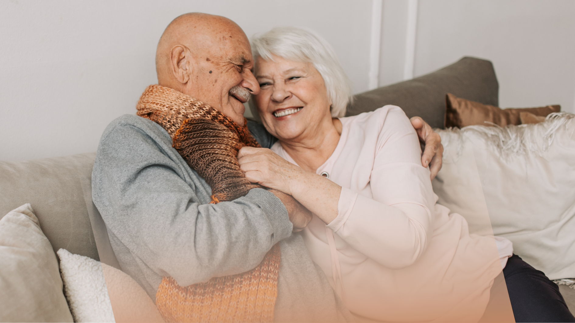 Satisfied elderly couple smiling in their spotless home after professional senior-friendly cleaning service