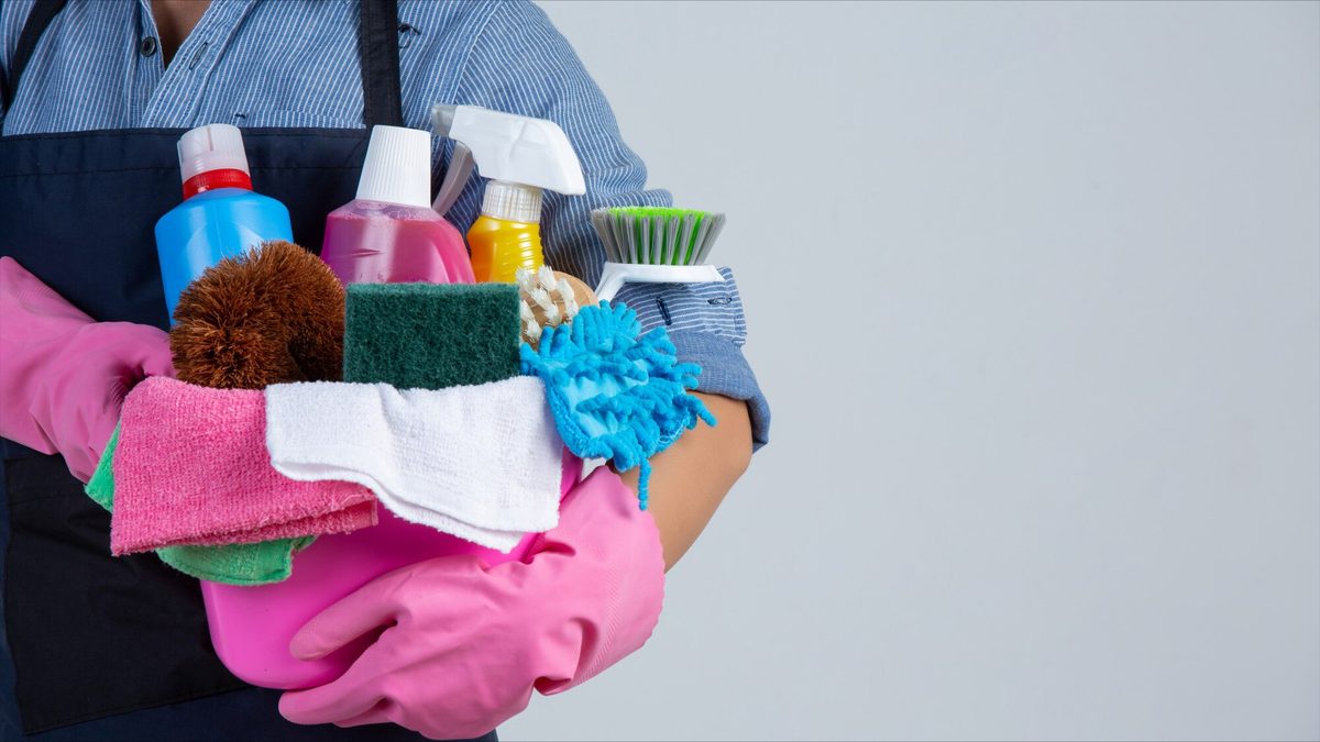 Cleaner holding cleaning supplies and brushes