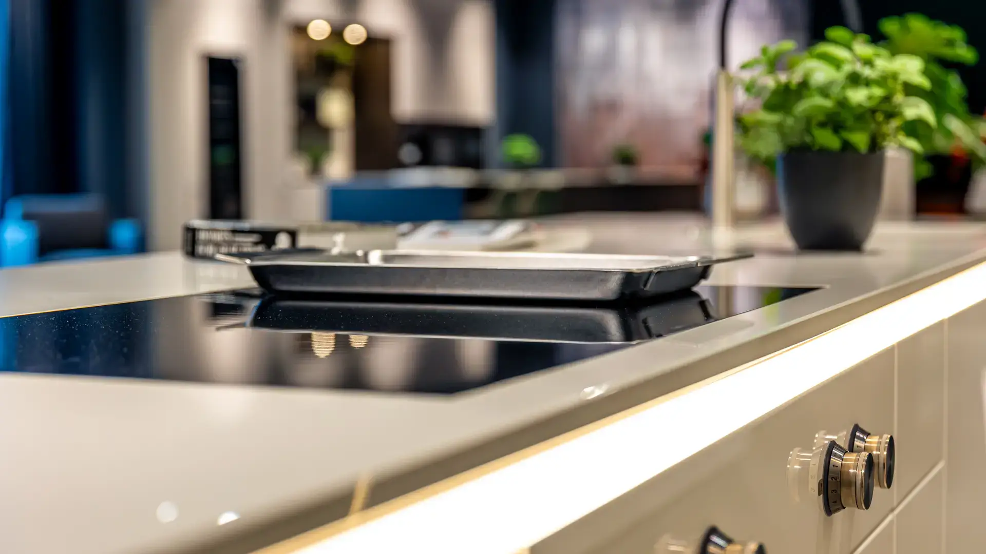 Induction hob on modern white kitchen countertop