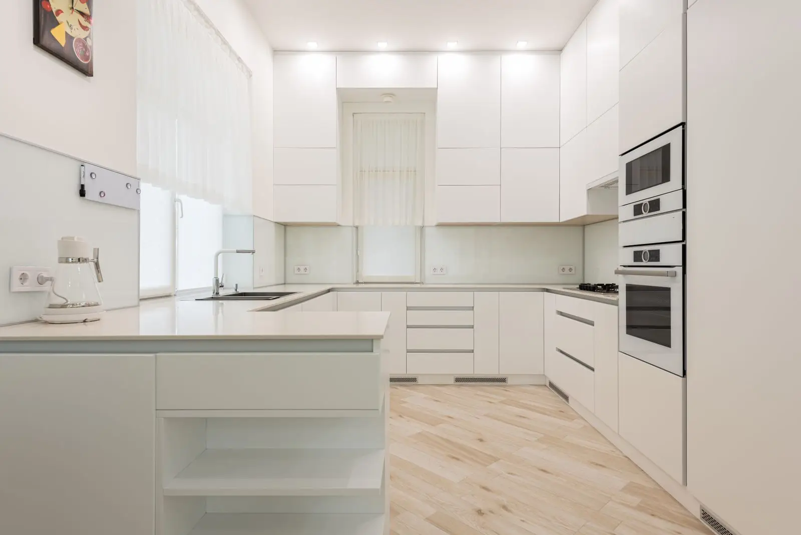 Bright white kitchen deep cleaned before a move in in Plano Texas