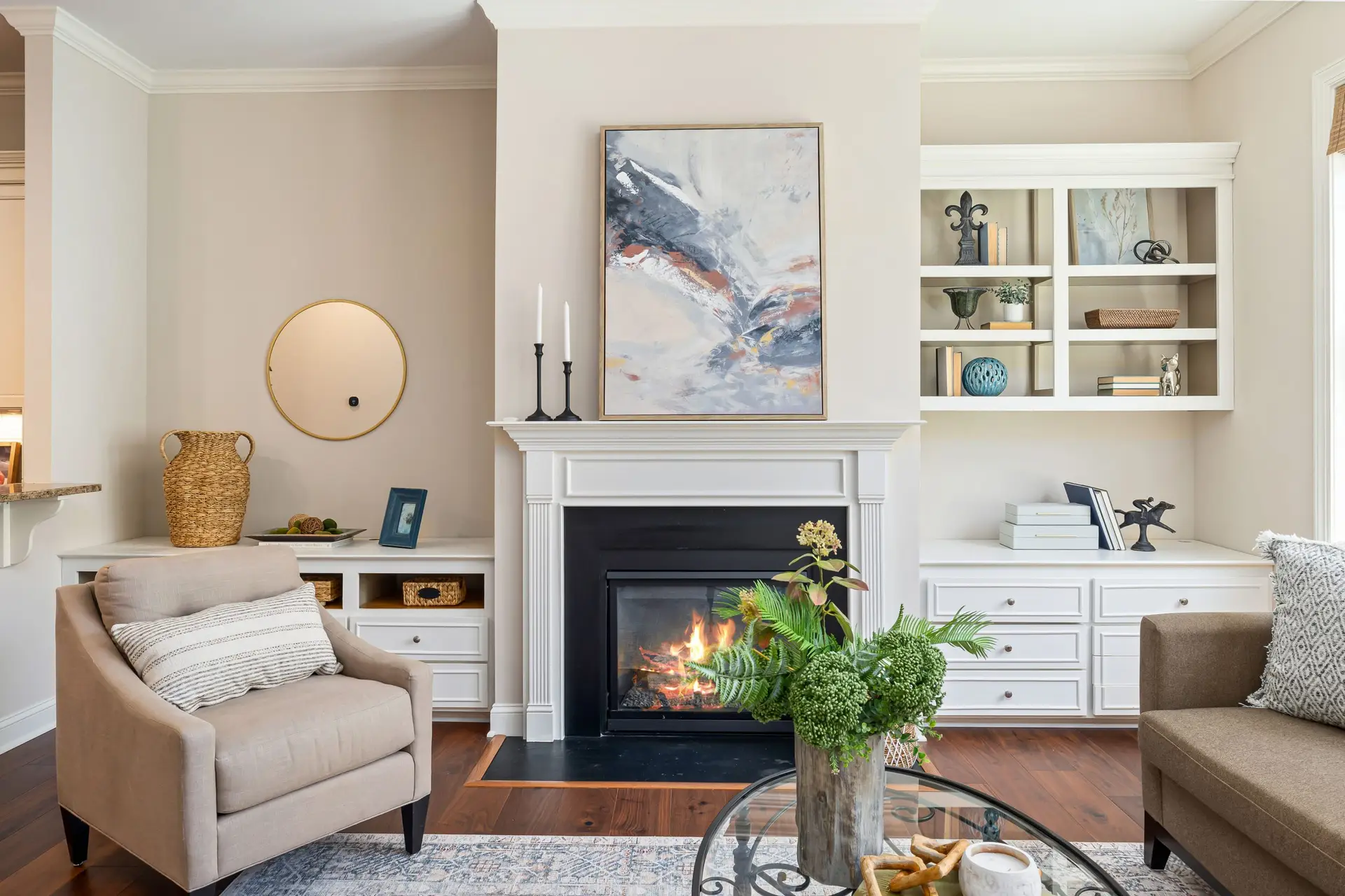 Tidy bright living room with white shelving in a Denton TX home