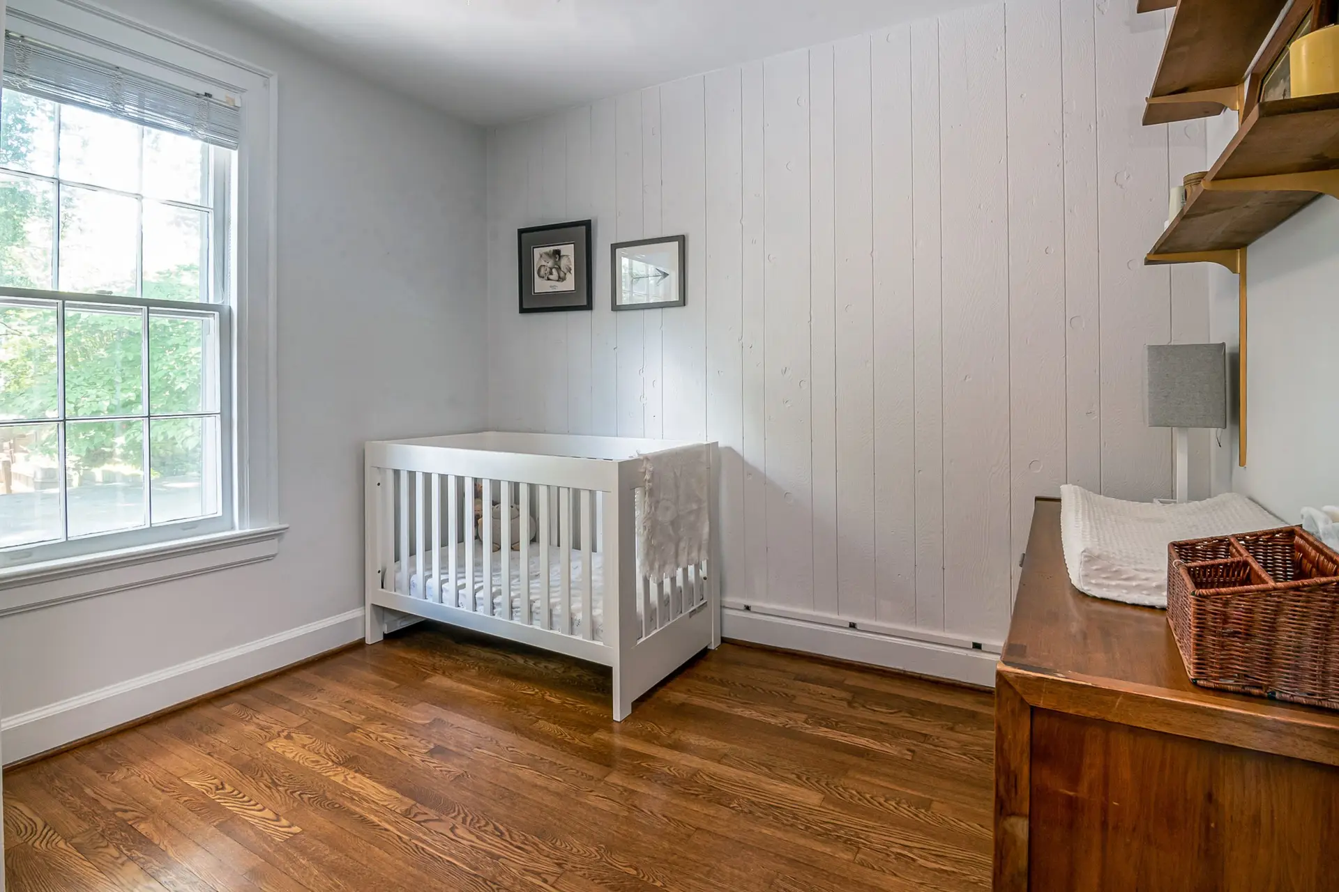 Bright clean nursery representing housekeeping help for new parents in West Plano TX