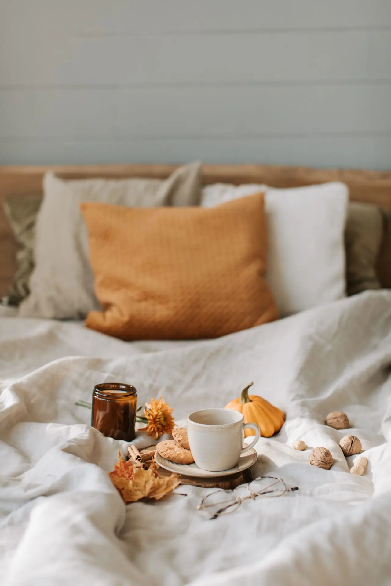 Calm bright bedroom with a cup of tea for a low energy day