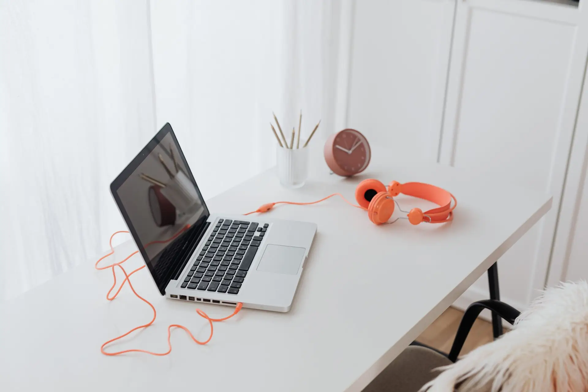 Bright clean desk with laptop representing a Richardson TX home office