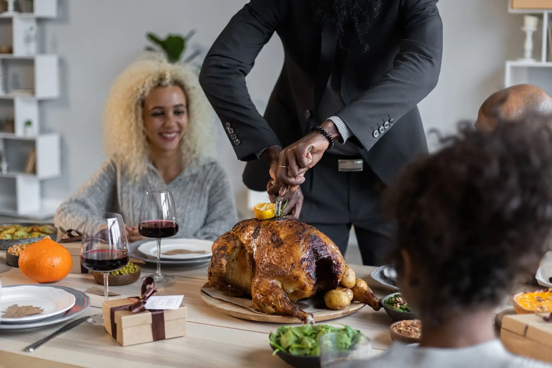 Thanksgiving dinner being carved at a McKinney TX family gathering